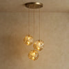 Suspension Luminaire Design - Halo Acrylique Raffiné | Luméor - Ambre à 3 têtes / Variation d'intensité par la tél |   Delvanie