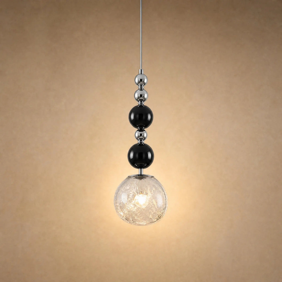 Suspension art déco à perles noires et globe craquelé transparent de 15 cm | Delvanie