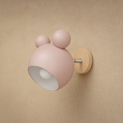 Applique murale Nemuria rose poudré, globe laqué mat et platine en bois clair | Delvanie