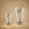 Les deux tailles de la lampe chromée côte à côte, Ø 17 et Ø 25 cm | Delvanie