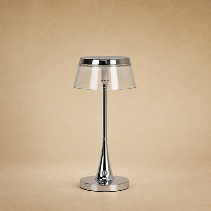 Lampe rechargeable Sévali, abat-jour transparent et couronne chromée, hauteur 27 cm | Delvanie